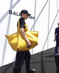 8 Things To Know About Balenciaga S Spring 2017 Men S Show Yellow Balenciaga Balenciaga Bags