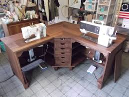P This 8220 L 8221 Shaped Table Made Out Of Eastern Walnut Has Two Machines Lifts Center Drawe Sewing Room Furniture Sewing Table Sewing Room Inspiration