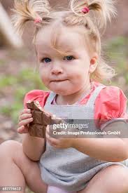 218 Holding Candy Bar Stock Photos, High-Res Pictures, and Images