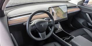 There are no physical controls, which can make sifting through the touch screen's menus risky while driving. Minimalist Interior Of Tesla Sedan Model 3 Tesla Model3 Review Design Interior Performance Pricing Tesla Sedan Tesla Model Tesla