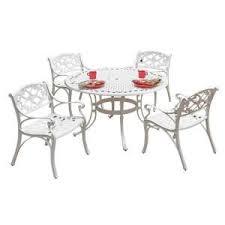 Outdoor cafe table stacking chairs parasol hole home garden patio furniture set. Home Styles Biscayne 42 In White 5 Piece Round Patio Dining Set With Green Apple Cushions 5552 308c The Home Depot Round Outdoor Dining Table Round Patio Dining Set Patio Dining Set