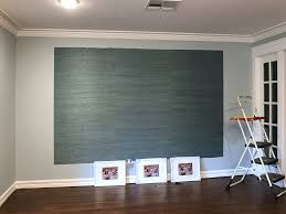 Wallpaper accent walls are here to stay, and this space sings with bold energy. A Peek At The Entryway Grasscloth Accent Progress Plus How To Hang Grasscloth Very Easily Addicted 2 Decorating