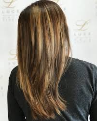 The long layered wavy hair look on the locks in a form of spirals gives the whole hair a volume. Layered Hair Layer Cut Images For Long Hair