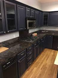 Dark Navy Resurfaced Cabinets Making A Statement In This Kitchen Kitchen Inspiration Design Modern Kitchen Cabinet Design Modern Kitchen Design