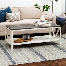 Contemporary in style, this coffee table features a stainless steel framework finished in a brushed brass with a round acacia veneer top in a dark walnut stain washed with a light gray glaze. Walker Edison Distressed Farmhouse Coffee Table 48 In Grey White Wash Lwf48natctwwg Rona