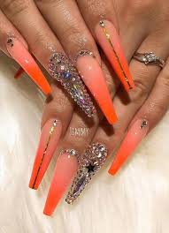 Diamonds look absolutely stunning with the most simplistic, matte white nails, especially if you besides these shades, you can also use colors inspired by the sunset (peach, red, orange and yellow) or a more. 70 Alluring Acrylic Coffin Nails Design For Long Nails Latest Fashion Trends For Woman Orange Acrylic Nails Long Acrylic Nails Coffin Coffin Nails Designs