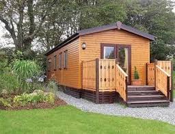 Lodges And Log Cabin Holidays In The Uk Holiday Homes For Sale Log Cabin Holidays Caravan Home