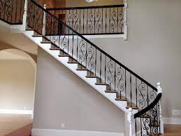 Accessorize with decorative aluminum foot covers to give your iron balusters a finishing touch. Master Fabrication Wrought Iron Staircase Design Center Residential Stair Design