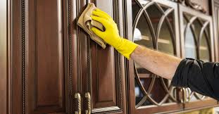 After letting it sit for a moment, wipe off the solution with fresh microfiber towel, again making sure to dry in the direction of the grain of wood. 4 Easy Ways To Clean Sticky Wood Cabinets With Tips Country Diaries