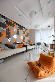 Since orange is the color of the sun, it's only natural that it creates a bright and warm atmosphere. 32 Stylish Geometric Decor Ideas For Your Living Room Digsdigs