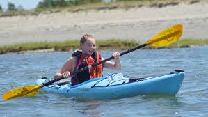 Explore the water while paddling wiut. Paddle Boston Charles River Canoe Kayak Sales Rentals Trips Instruction And Gear In Boston Kids Summer Paddling Programs