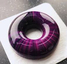 Black And White Mirror Glaze Cake Mirror Glaze In Pink Purple On Donut Cake Placed On White Cake Tray On Black Surface In 2020 Mirror Glaze Cake Recipes Mirror Glaze Cake Mirror Glaze