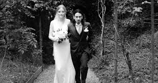 Karadottir And Harrison Take A Private Moment Before Making Their Way To The Reception