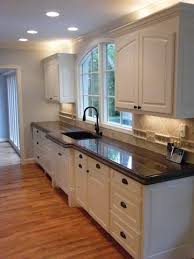 The kitchen cabinets brown come with impressive materials and designs that make your kitchen a little heaven. Dark Brown Kitchen Countertops Novocom Top