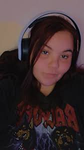 Barbie pink glitter nails with black hearts