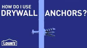 Small plastic wall anchors are suitable for items under 10 lbs., while the largest anchors can hold up to 30 lbs. How Do I Use Drywall Anchors Diy Basics Youtube
