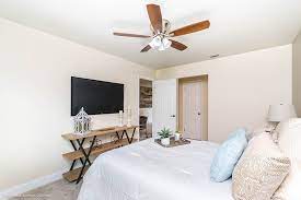 Keep window treatments to a minimum in a small space to make the most of the natural light and keep the look unfussy. How To Make A Small Bedroom Look Bigger To Buyers Mhm Professional Staging