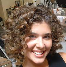 Short Curly Hairstyles For Round Faces Short Permed Hair Short Curly Haircuts Curly Hair Styles Naturally