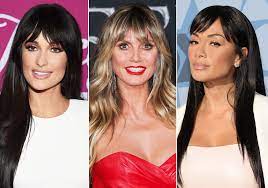 Hollywood heads that have always been draped in long extensions are finally going the way of sleek bobs, folks are letting their natural curls flow freely, and colorists are doing really interesting and bold things with their clients' manes. Celebrities With Bangs Best Haircuts With Fringe