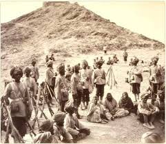 Photograph of a group of Afghan prisoners with a Sikh escort, taken by John Burke in 1878.