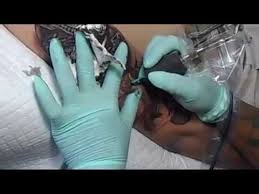 The picture tattooed was a balinese dancer. Paradise Ink Tattoo Bali Balinese Dancer Barong Mask Youtube