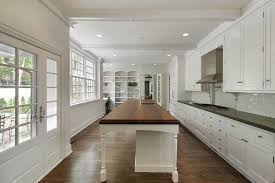 Kitchen islands are a common addition to modern kitchen design. Small Rectangular Kitchen Layout Novocom Top