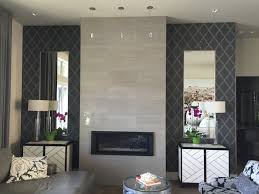 Beautiful living room with gray wainscoting paneled walls and fireplace accented with a pair of tt single wall lights in hand rubbed antique brass over a marble fireplace surround and hearth framed by herringbone hardwood floors. Living Room Fireplace Feature Wall Contemporary Living Room Vancouver By L L Applications Houzz Ie