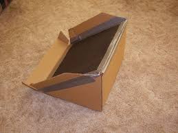 Side And Back View Of Cardboard Box Book Holder Outreach Therapy Consultants Adaptive Equipment Adaptive Tools Low Tech
