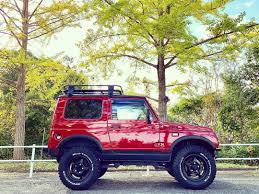 純正色の赤メタ マットブラック2トン仕様 jimny ジムニー ja12 ラジアントレッドマイカ マットブラック 2トン ハードタックル マッテレ jimkentac コンプリートカー 世代的には西部警察のスカイライン色 いつもの場所で 横撮り desain