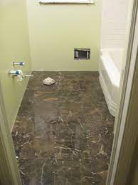 Modern and very tiny baseboards. Bathroom Renovation How To Install Baseboards Trim Young House Love