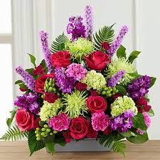 Order sympathy flower arrangements for delivery to the area. Warm Embrace Arrangement