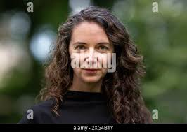 Potsdam, Germany. 06th July, 2024. Author Iris Wolff stands in the park of  Villa Jacobs at the Potsdam literature festival "LIT:potsdam". The motto of  the festival from 02.07. to 07.07.2024 is "Forward