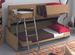 Both bunk beds have panelled head and. A Modern Miracle A Mini Sofa That Turns Into A Bunk An Organized Life