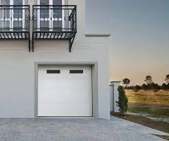 Vous garantir le bon achat, on y travaille tous les jours. Porte De Garage Sectionnelle Motorisee Artens Essentiel 200 X 300 Cm Avec Hublot Leroy Merlin