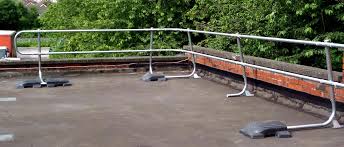 A detent pin on each pivot assembly locks the safety guard rail in the upright position. Roof Guardrails Guard Rail Safety Fall Protection Roof Edge Protection