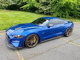Blue Ford Mustang Gt With Bronze Wheels Ford Mustang Ford Mustang Gt Blue Mustang