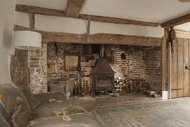 The Heavily Beamed 16th Century Drawing Room Is Home To A Huge Inglenook Complete With Bread Oven That E Inglenook Fireplace Cottage Interiors Cottage Lounge