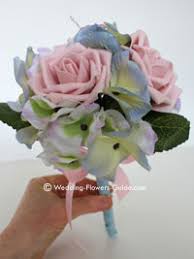 Embrace this unique fall wedding color palette by adding blue thistle and dark orange roses to your bouquets. Blue Wedding Flowers Ideas Beloved Blog