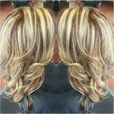 So my question is, is there anyway to lighten it a i really don't want to damage it anymore especially this soon after bleaching. Red And Blonde Highlights And Lowlights Chunky Sliced Highlights Redken Hair Color Hair Highlights And Lowlights Hair Highlights Redken Hair Color