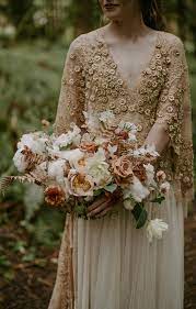 Boho wedding inspiration with an abundance of white + cream textured florals | green wedding shoes. 25 Favorite Boho Bridal Bouquets For The Wild At Heart Junebug Weddings