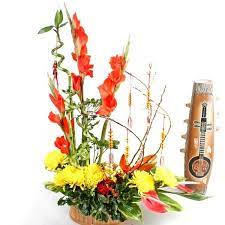 Anthurriums And Bamboo Chinese New Year Flower Flower Arrangements Flower Delivery