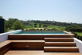 Good lighting is essential for a site like this. Modern Pool With Jacuzzi Novocom Top