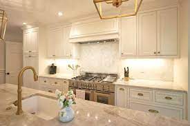 The Trend Is White Cabinets With Antiqued Brass Fixtures And Hardware Its Maki Transitional Kitchen Design Kitchen Renovation Inspiration New Kitchen Designs
