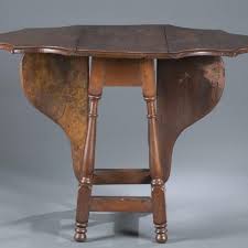 A circular dining table that expands when rotated. All About Antique Expanding Tables Antique Trader