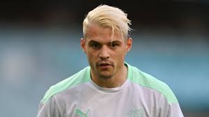 Watch moment arsenal star granit xhaka shows drastic new blonde hair to wife leonita leaving her stunned the sun; Attbc Fzsyb21m