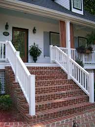 White Porch With Red Brick Steps Brick Steps Brick Porch Front Porch Steps