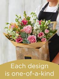 A lovely bouquet to soothe and comfort, a variety of white and peach blossoms se. London Florist Flower Delivery By A G Price Florist