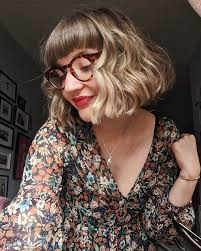 Short blunt bangs with curly hair. Bangs For Round Face Shapes 22 Flattering Haircuts