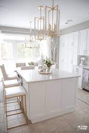 Some of them are, flooring color and material, countertops color and material also you can pay attention to the backsplash. Our Dark To White Kitchen Remodel Before And After Setting For Four