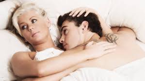 Young blond woman with little boy in bed, mother and son, happy. Private Eye Explains How To Spot A Cheating Partner Stuff Co Nz